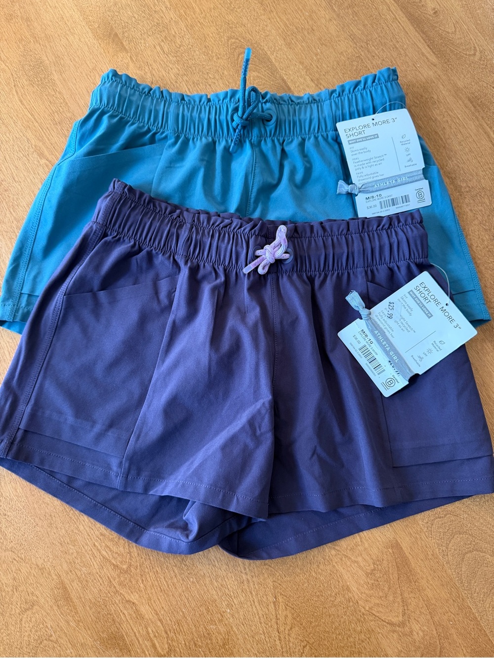 Athleta girl Explore More 3” Shorts in Teal and Purple